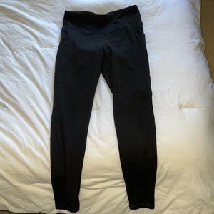 Daskin brand high waisted leggings. Size Small, worn, pockets on the side.